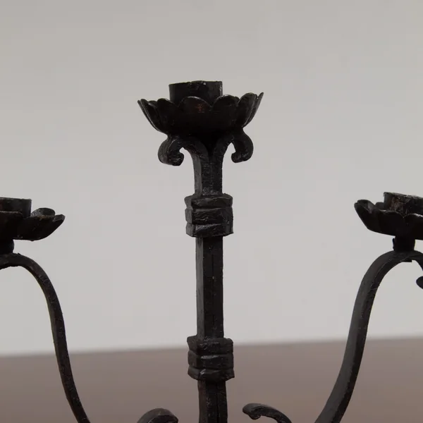 Pair of Brutalist Iron Candleholders with Sculptural Scroll Arms