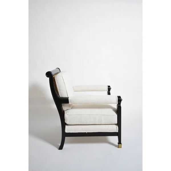 Pair of neoclassical ebonised wood and caning armchairs, 1960s